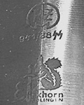 1938: Transitional mark showing both RZM & Squirrel with sword, without original